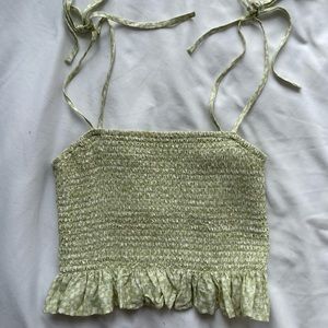 Cute light green tank top.